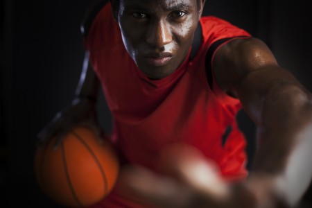 Playing a tough basketball game.